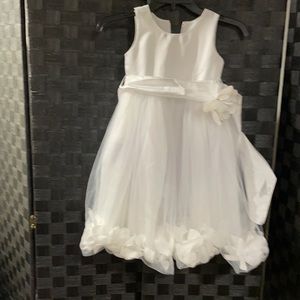 Darling white flower girl dress with bubble hem and flowers